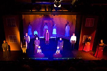An image of a play with stage lighting