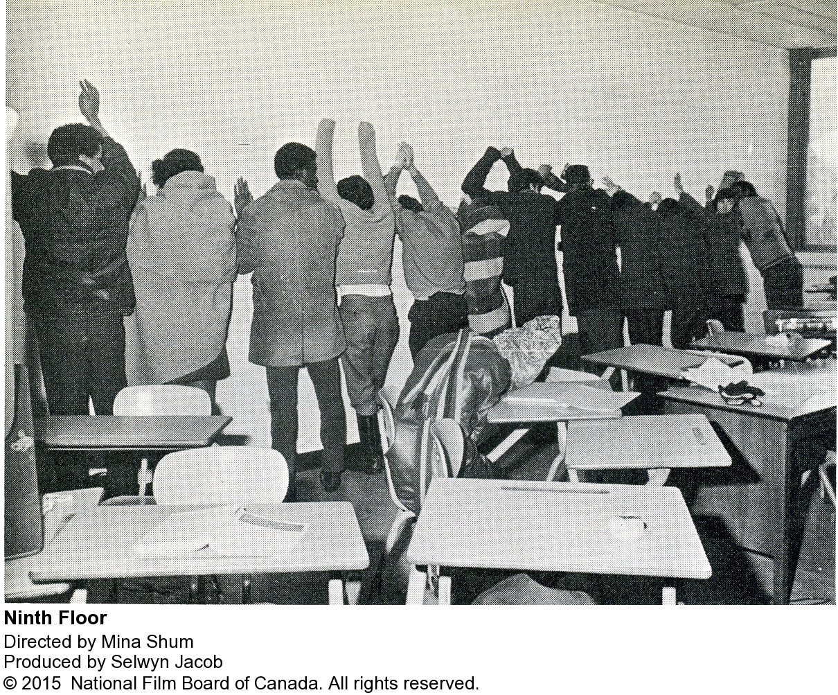 students-with-arms-on-wall.jpg