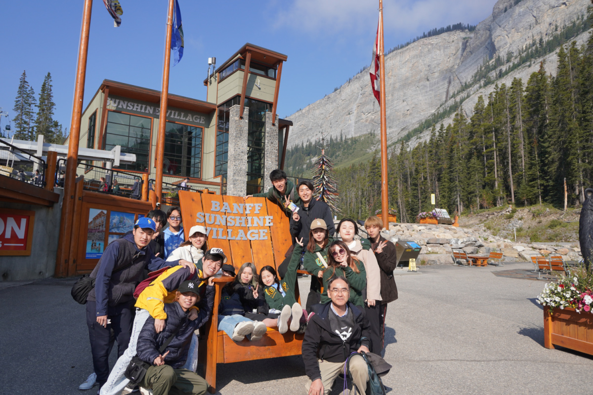 Group of students in front of Banff Sunshine Village sign
