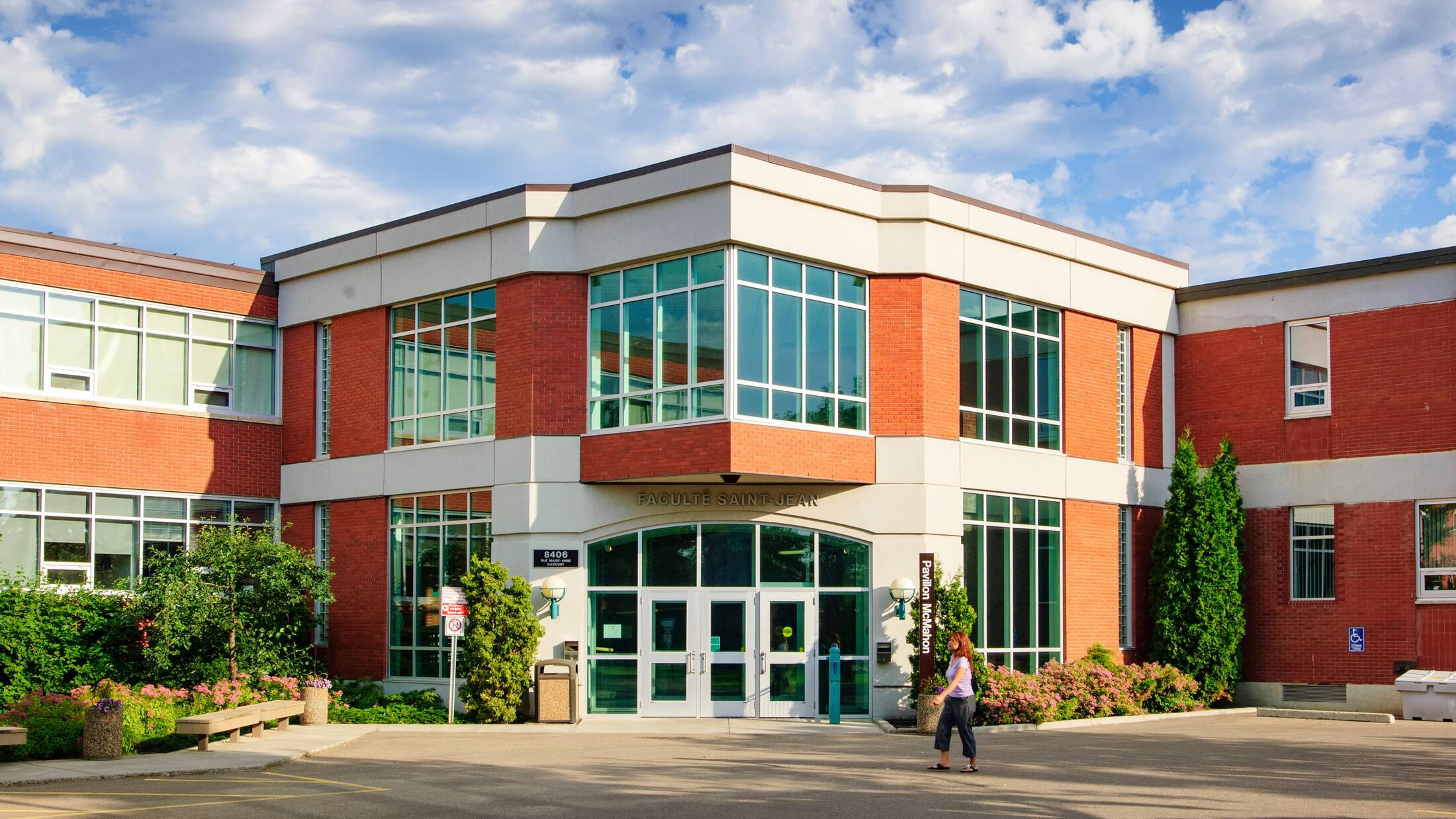 A student walks in front of CSJ.