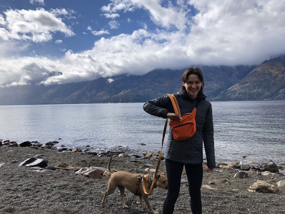 Hannah Cunningham pictured with a lake behind her.