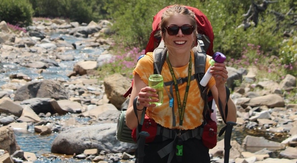 Kennedy Mitchell pictured in front of a creek.