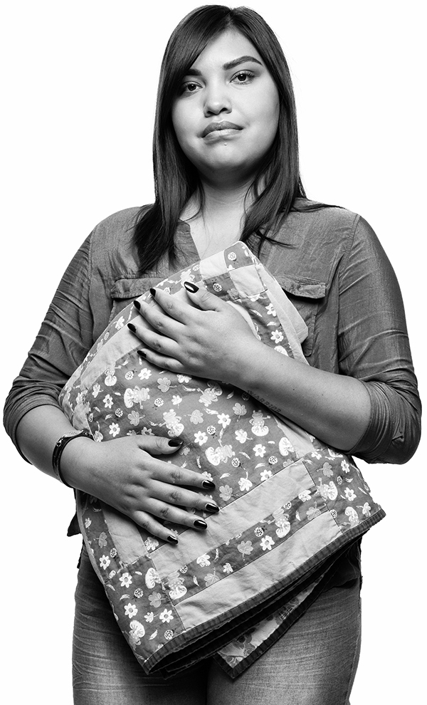 Keisha Cardinal holding a blanket.