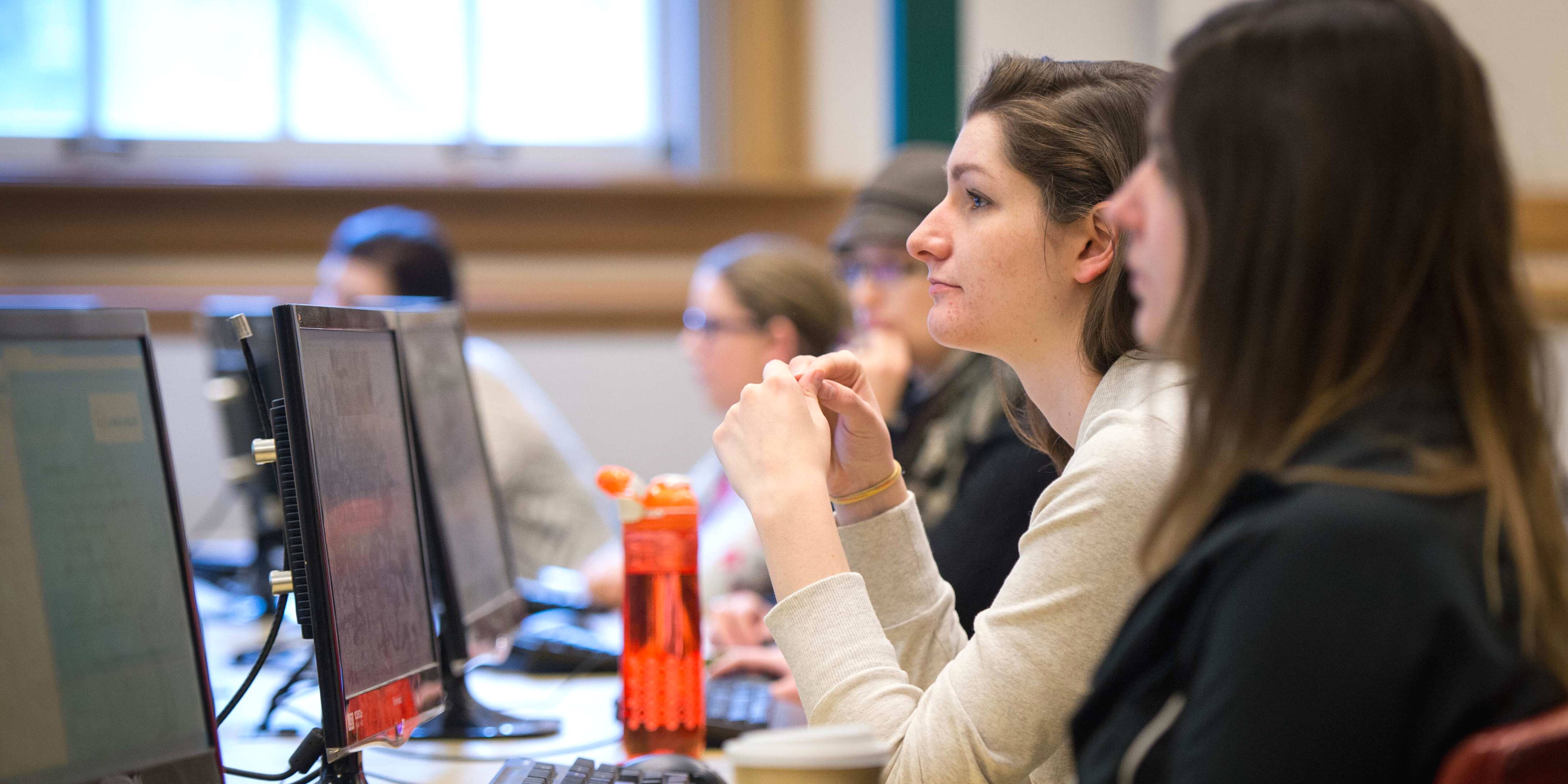 Students studying in computer lab.