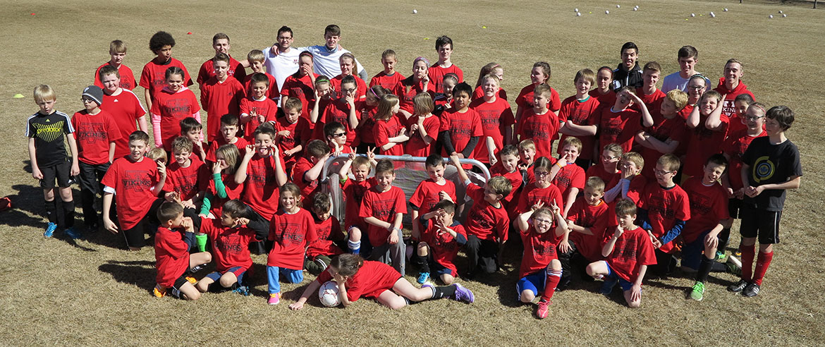 A photo of the attendees of the 2015 soccer summer camp