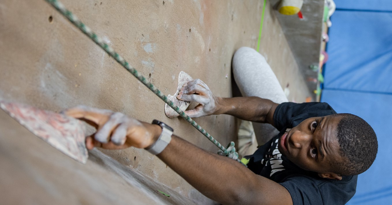 Man climbing wall