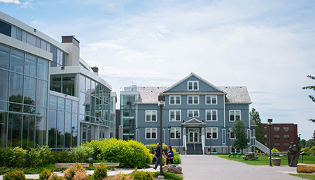 A photo of Founders Hall and the Forum on a sunny day