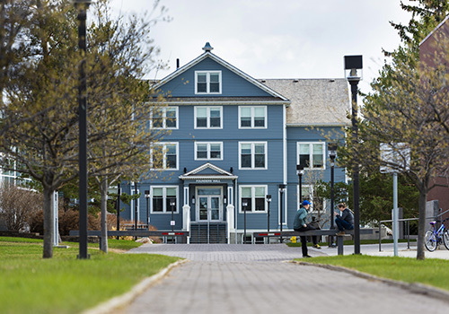 Photo of main campus walkway that leads to Founders' Hall.