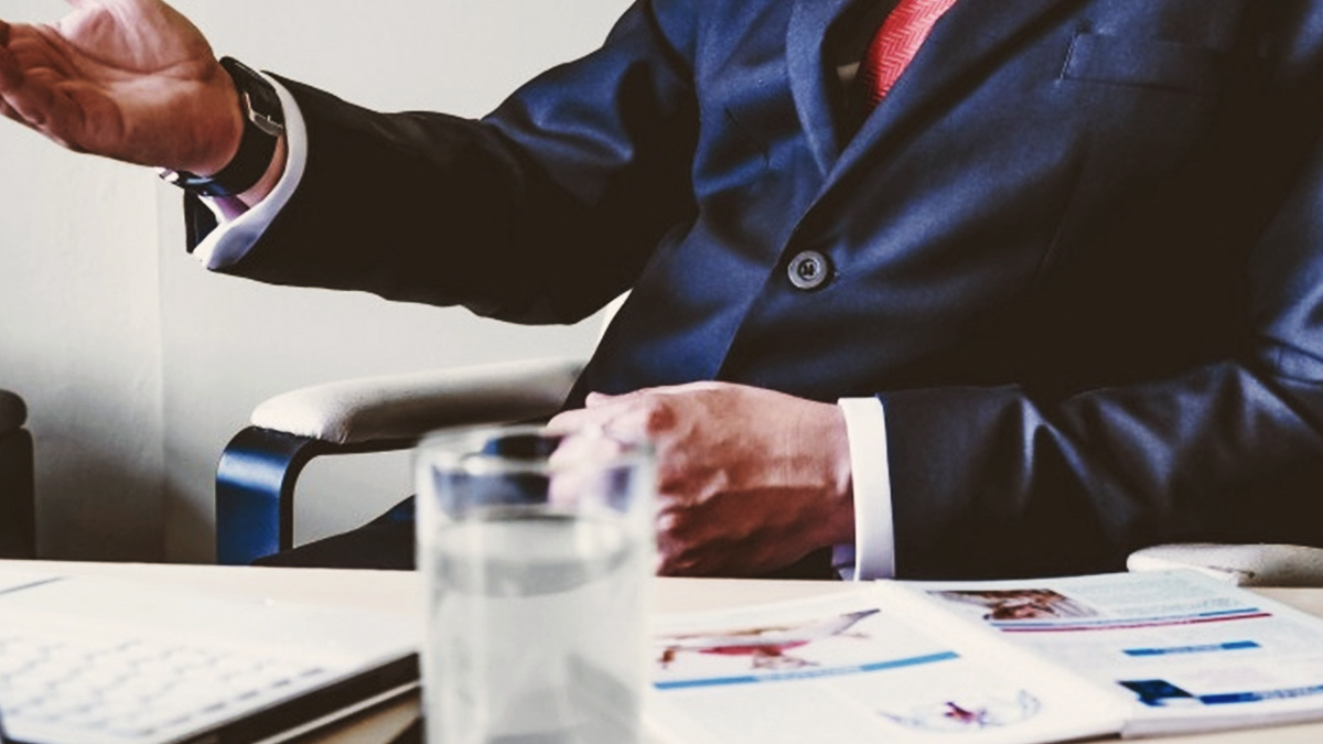 Man in suit at desk