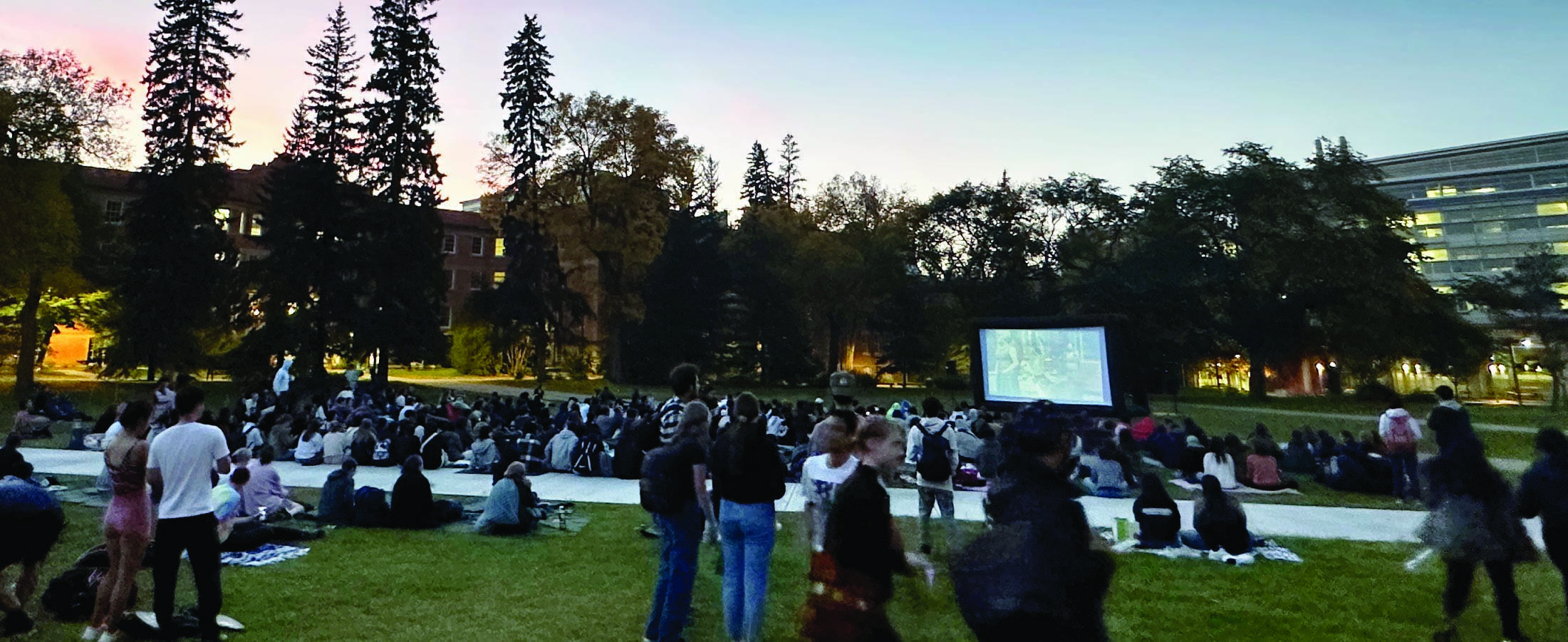 People watching movie at the Quad 