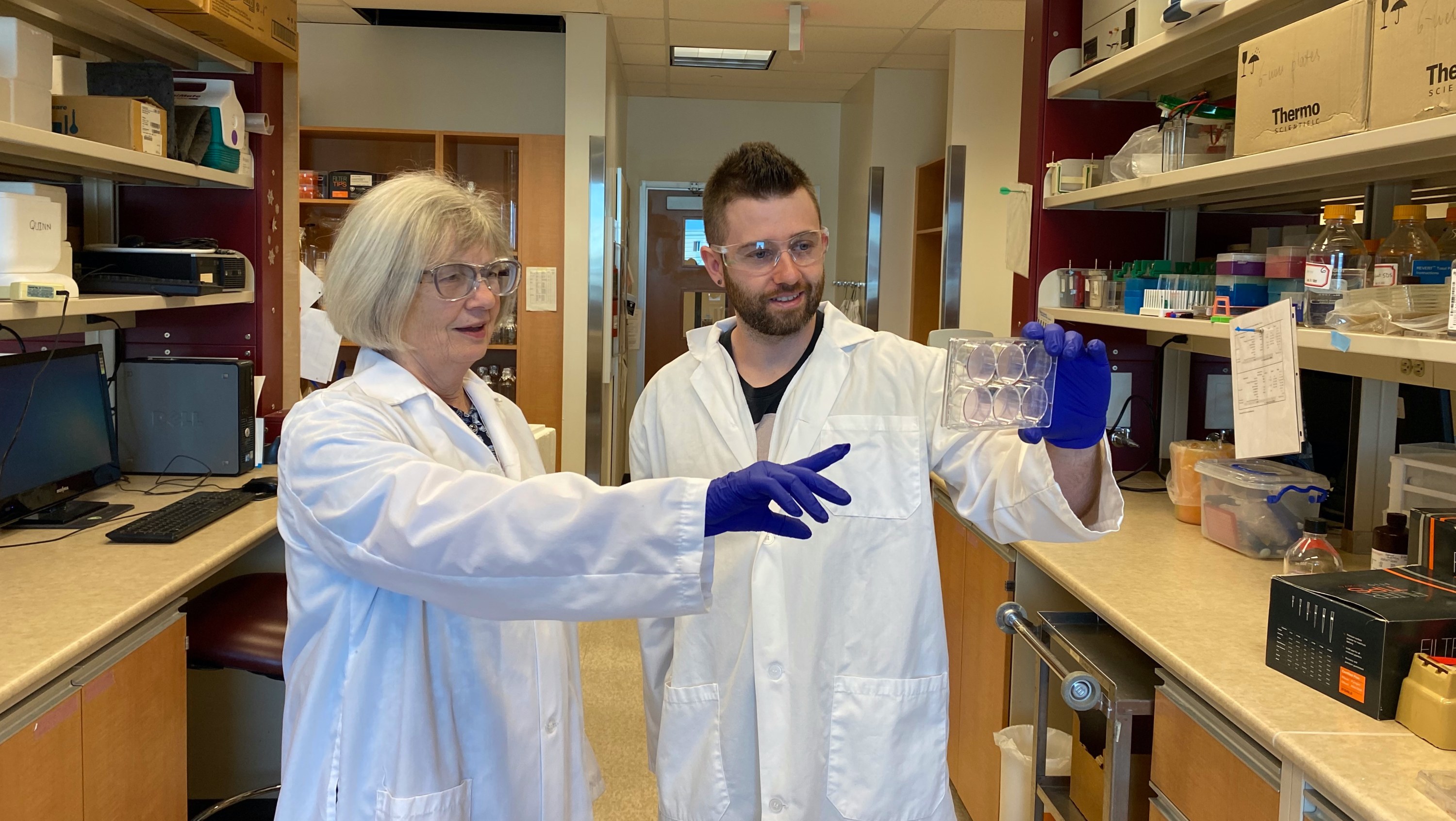 researchers in lab