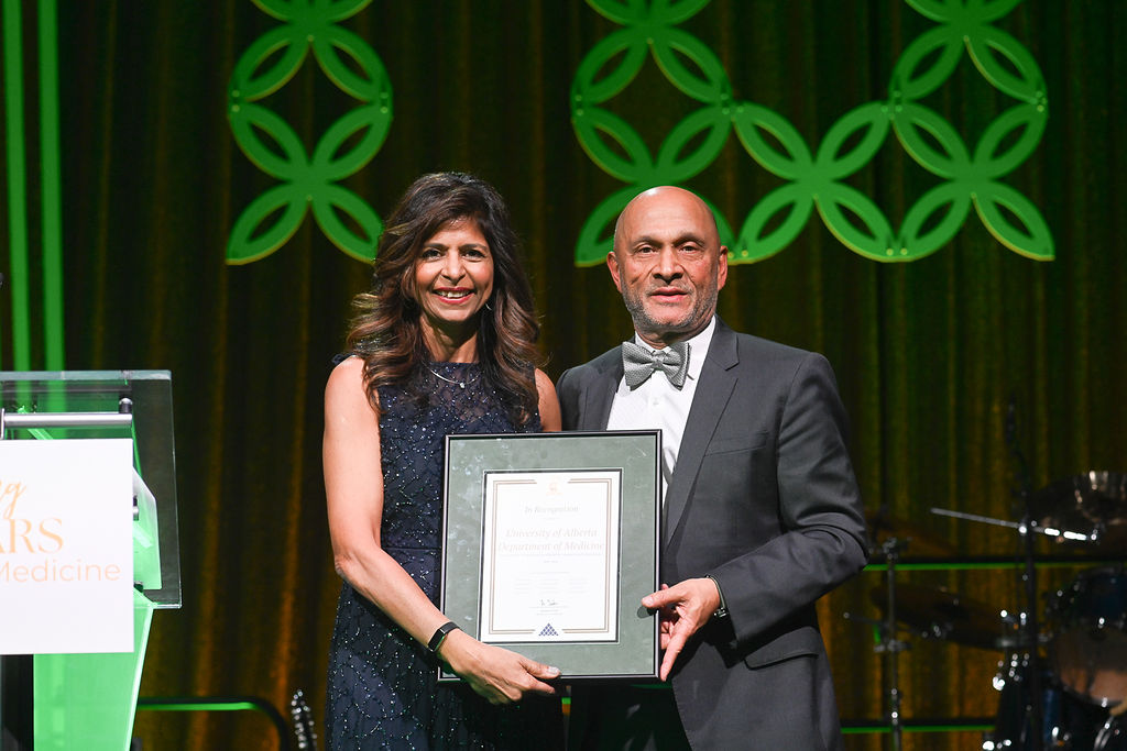 Chancellor Nizar Somji presents proclamation to Dr. Narmin Kassam