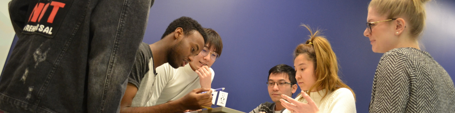 students sitting around table