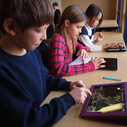 children working on computers