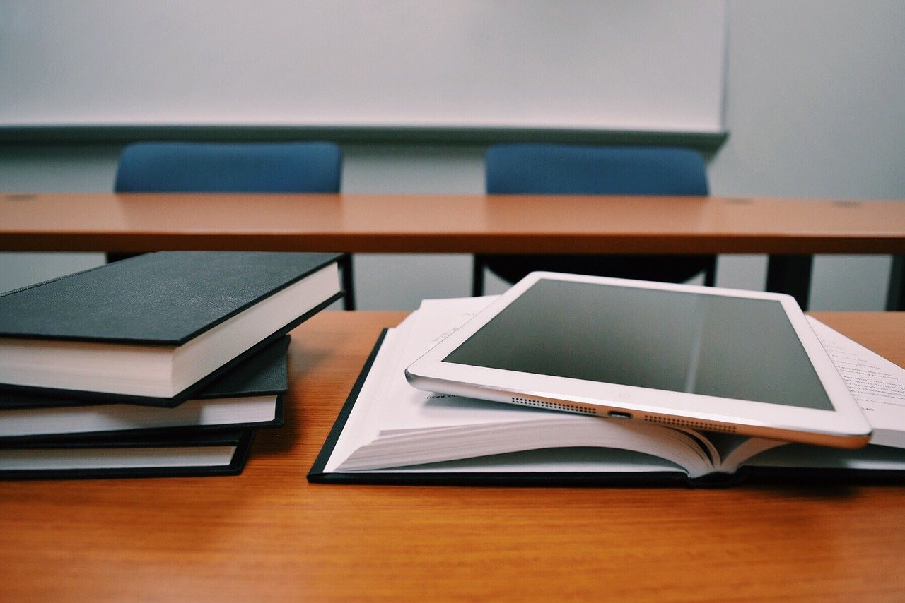 classroom with books and a tablet