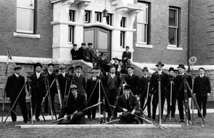 U of A founding President, Henry Marshall Tory (centre), with a civil engineering class and professor William Muir Edwards, at far right.