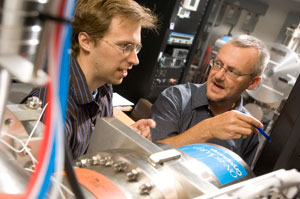 Dr. Michael Brett, right, is recognized not only as a renowned researcher but also as a dedicated teacher. Brett was awarded the University Cup, highest honour the U of A can bestow on a member of its academic staff, in 2007.