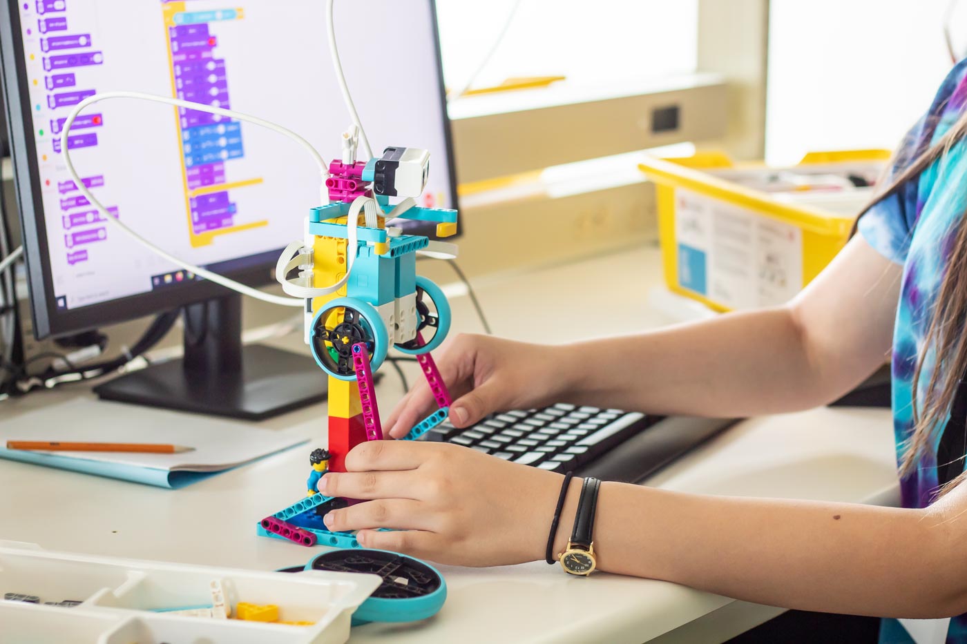 Child working with a robot