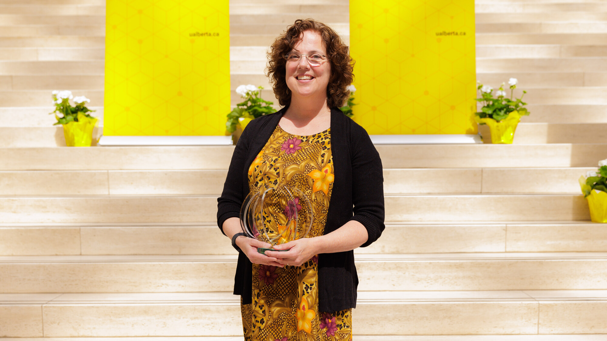 Colleen St. Clair with her award.