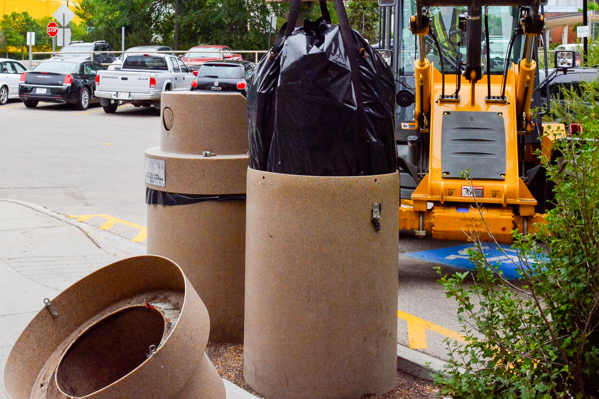 Installation of in-ground containers at Lister Residence.