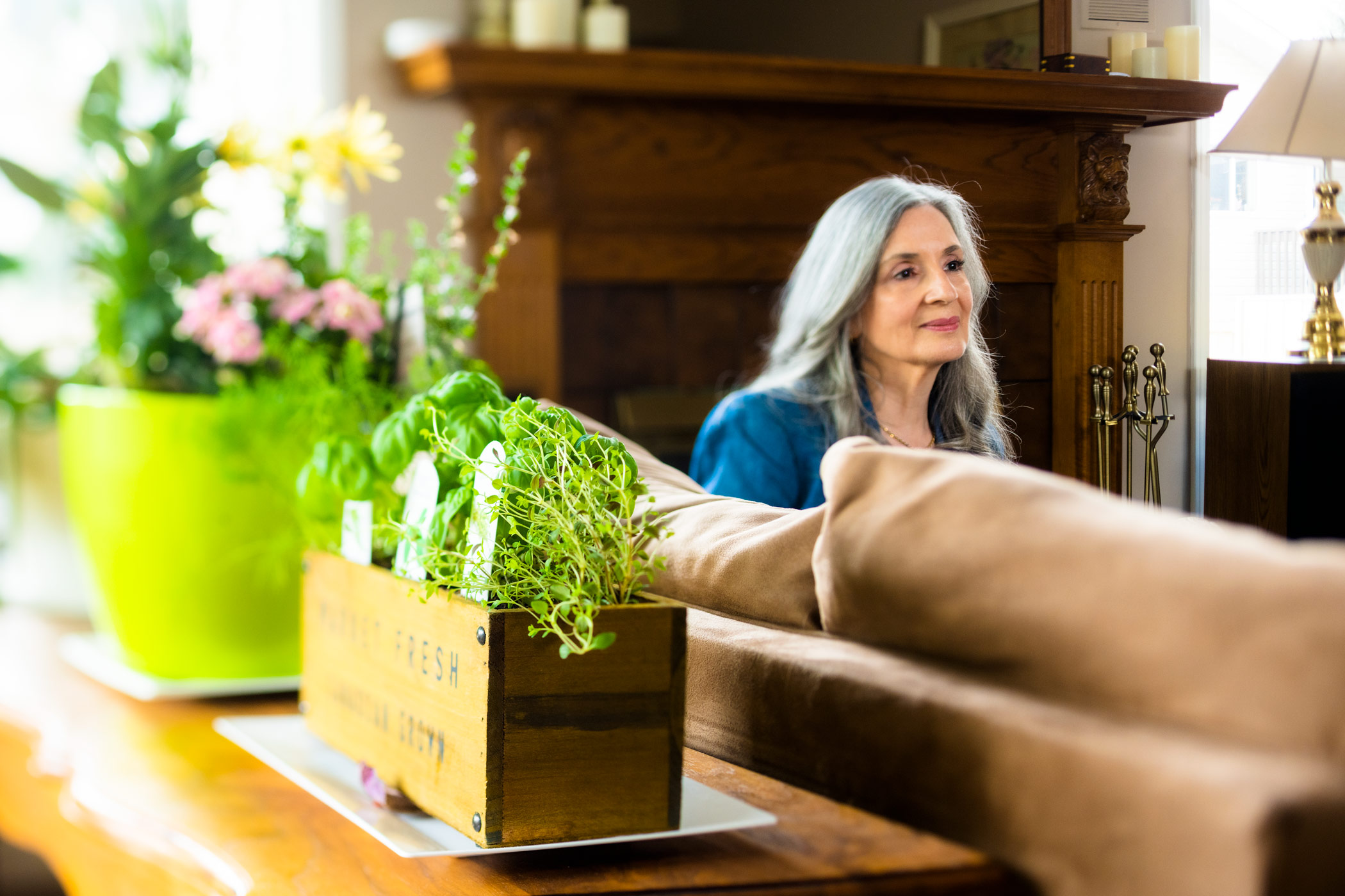 "Susan Sommerfeldt, assistant professor, Faculty of Nursing Sitting on a couch in her home