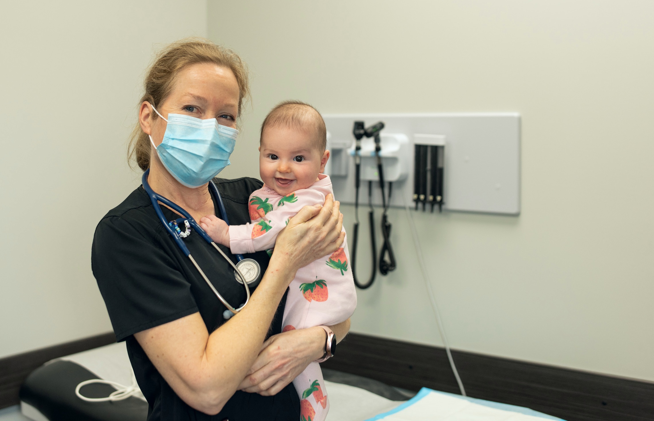 Family doctor Julie Herberger holds her four-month-old granddaugher, Olivia Dyck. (Photo: Jessica Kaitlyn Photography)