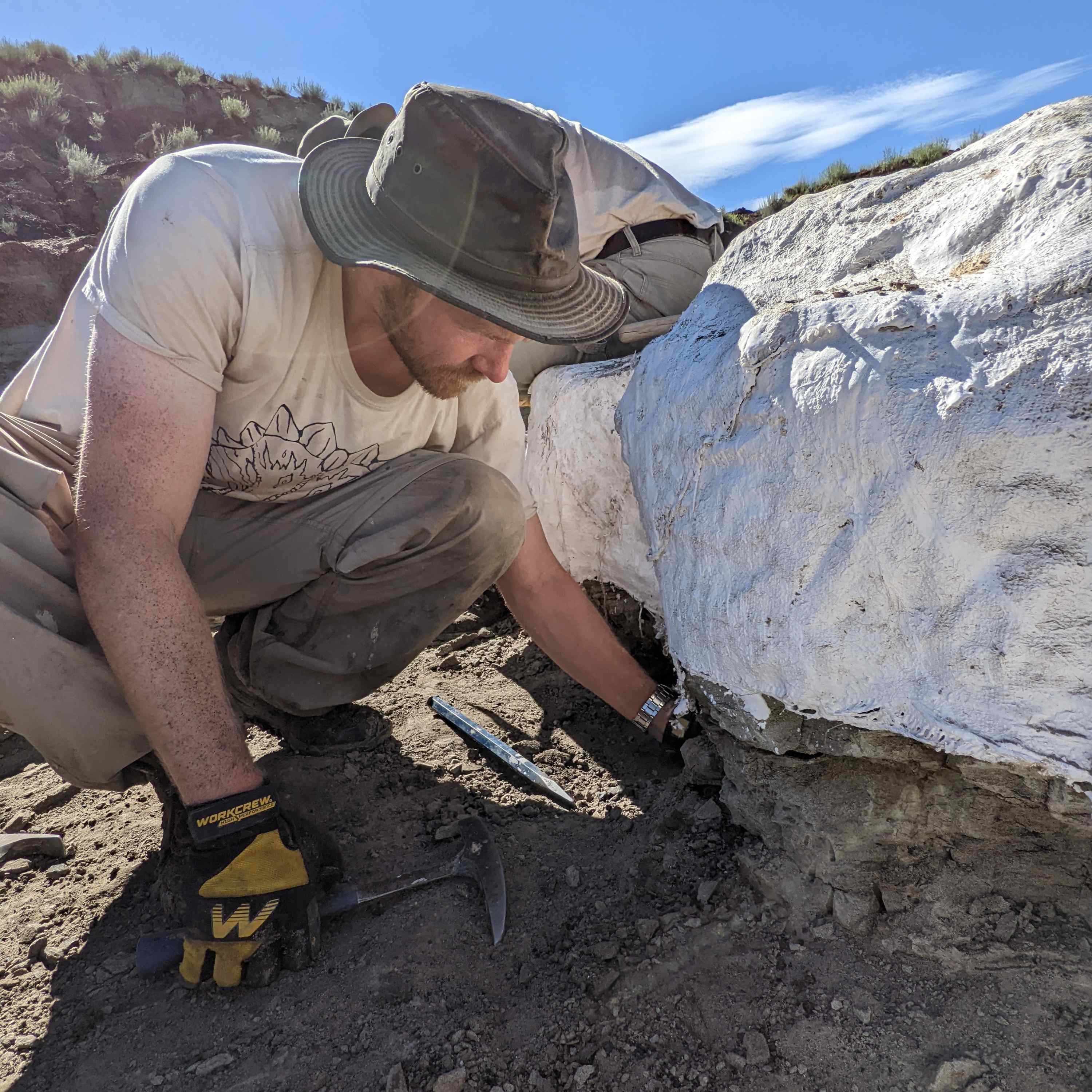 Mark Powers works at an excavation site.