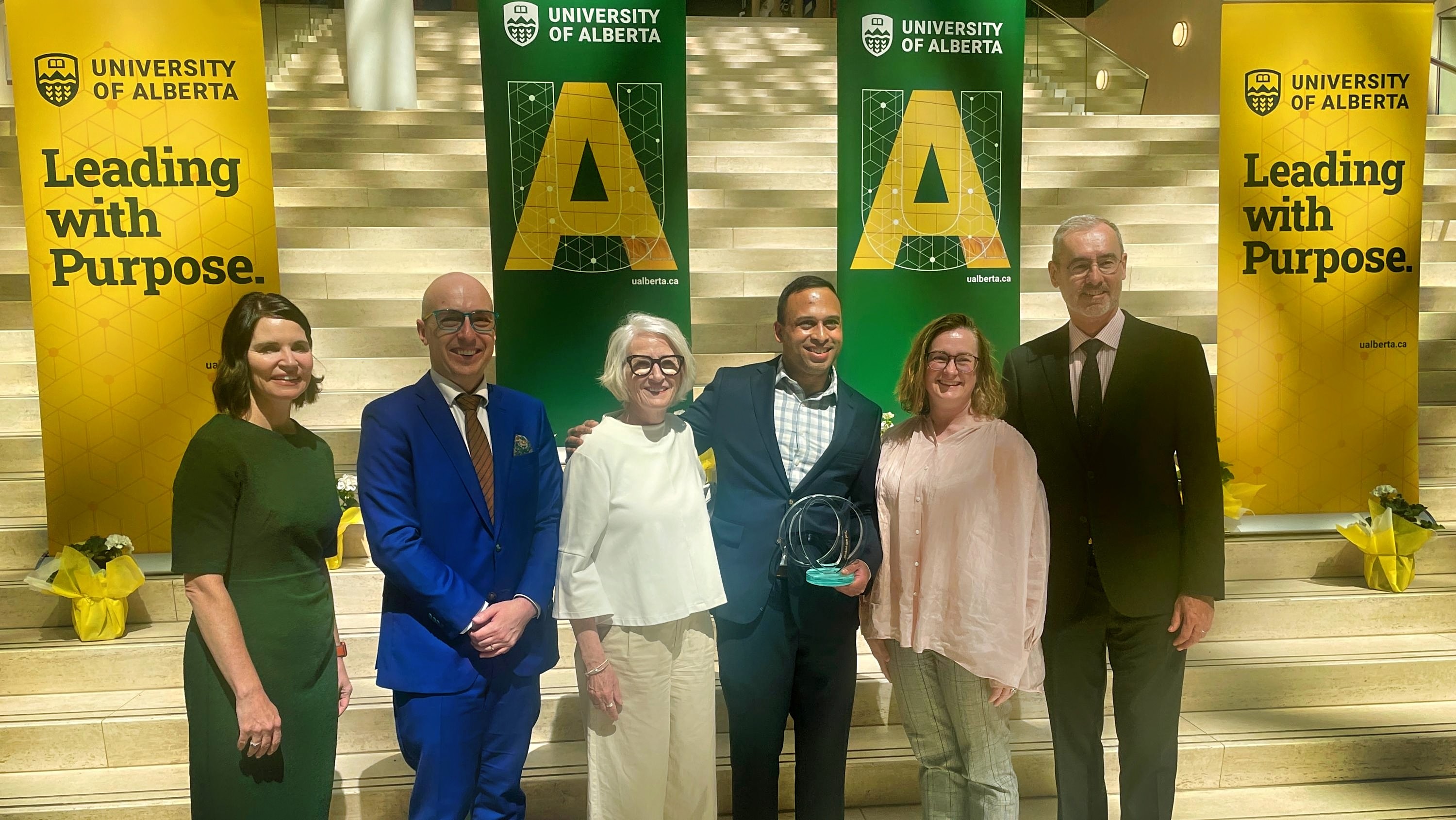 Community Leader Award winner Monty Ghosh (third right) was joined by U of A vice-president of external relations Elan MacDonald, Edmonton city councillor Andrew Knack, U of A chancellor Peggy Garritty, medicine professor Jennifer Ringrose and U of A president Bill Flanagan at a ceremony held May 15 at City Hall to recognize this year's recipients of the university's Community Connections Awards. (Photo: Supplied)