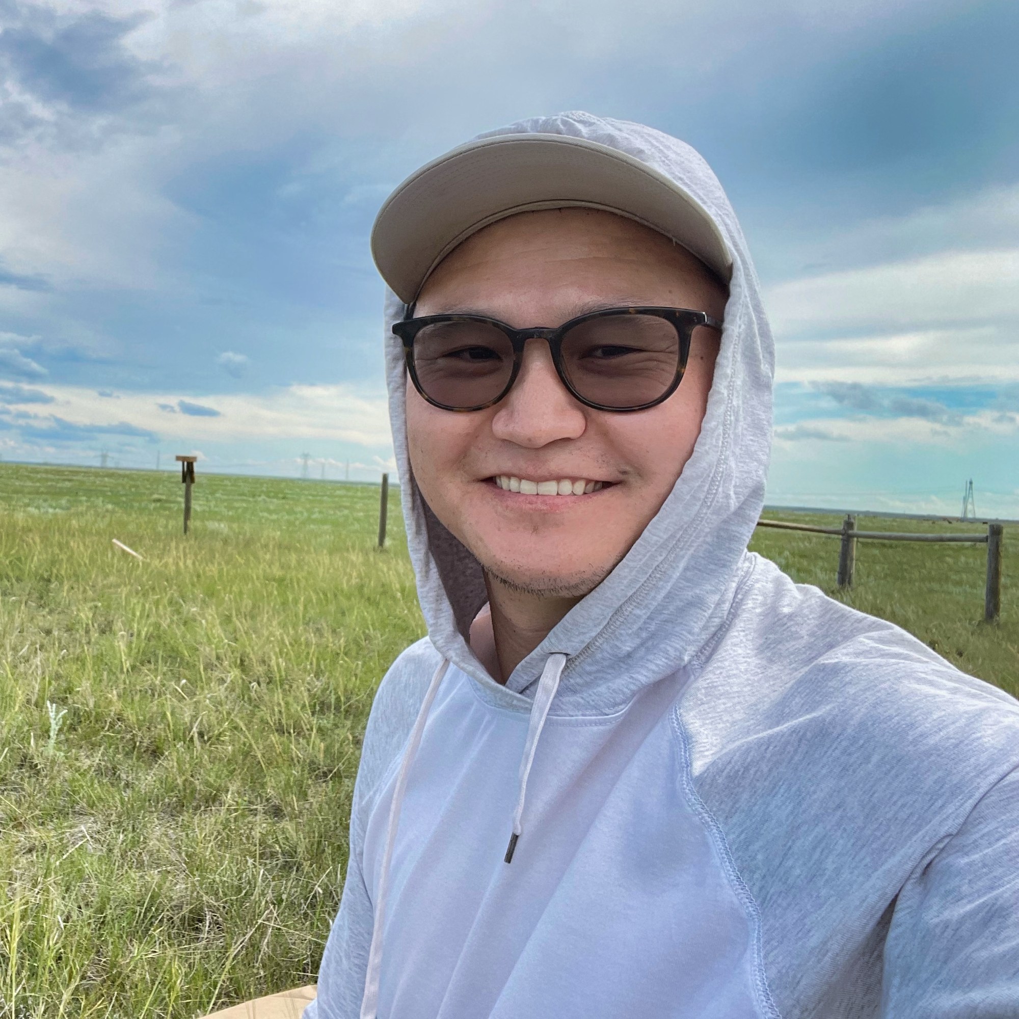 U of A researcher Batbaatar Amgaa is pictured doing field work on an experimental grasslands plot.