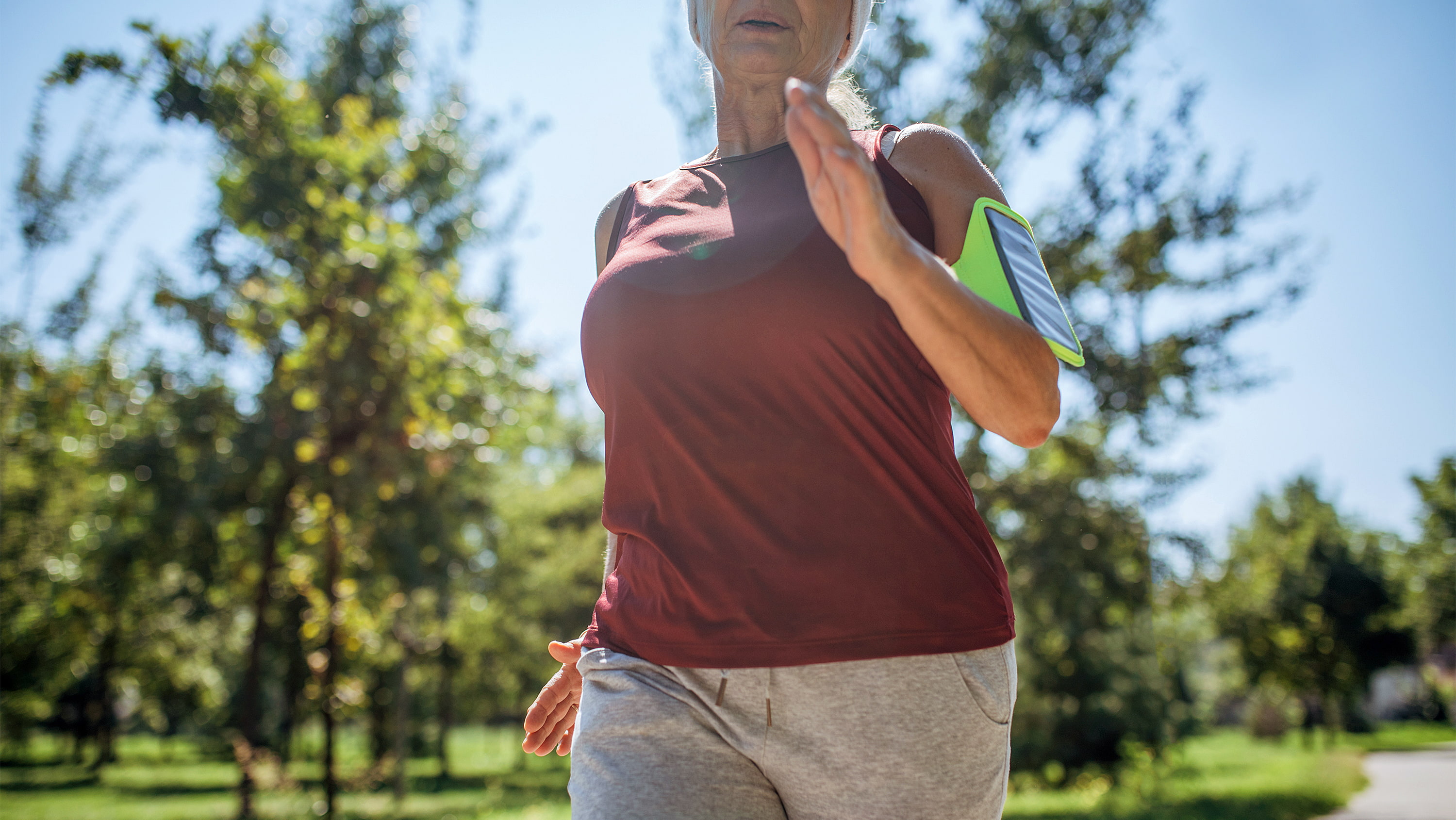 Older woman walks outdoors. (Photo: Getty Images)