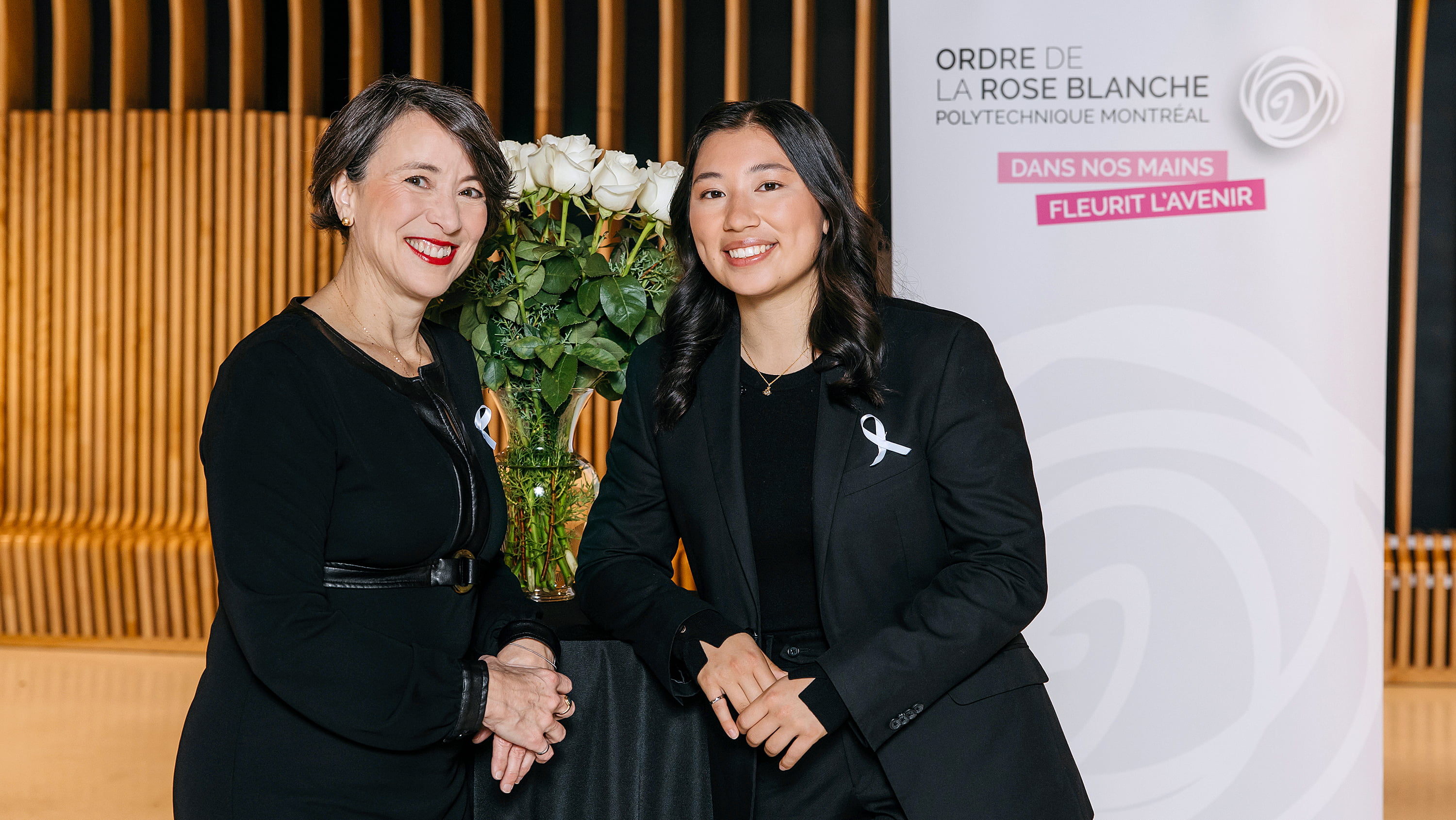 Makenna Kuzyk (right) with Nathalie Provost, survivor of the 1989 shooting and patron of the Order of the White Rose. Kuzyk is the 10th recipient of the memorial scholarship from Polytechnique Montréal. (Photo: Annie Diotte for Polytechnique Montréal)