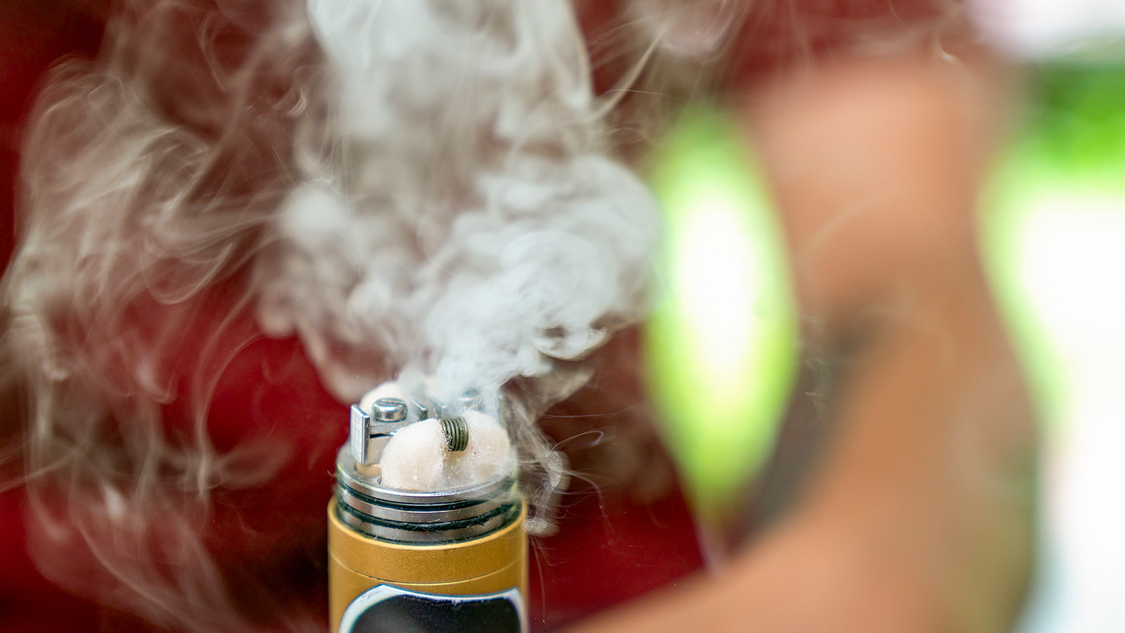 Close up of a woman vaping. (Photo: Getty Images)