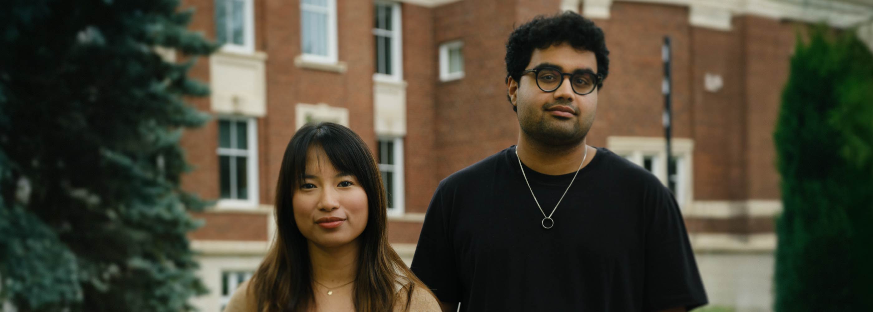 Two students standing outside