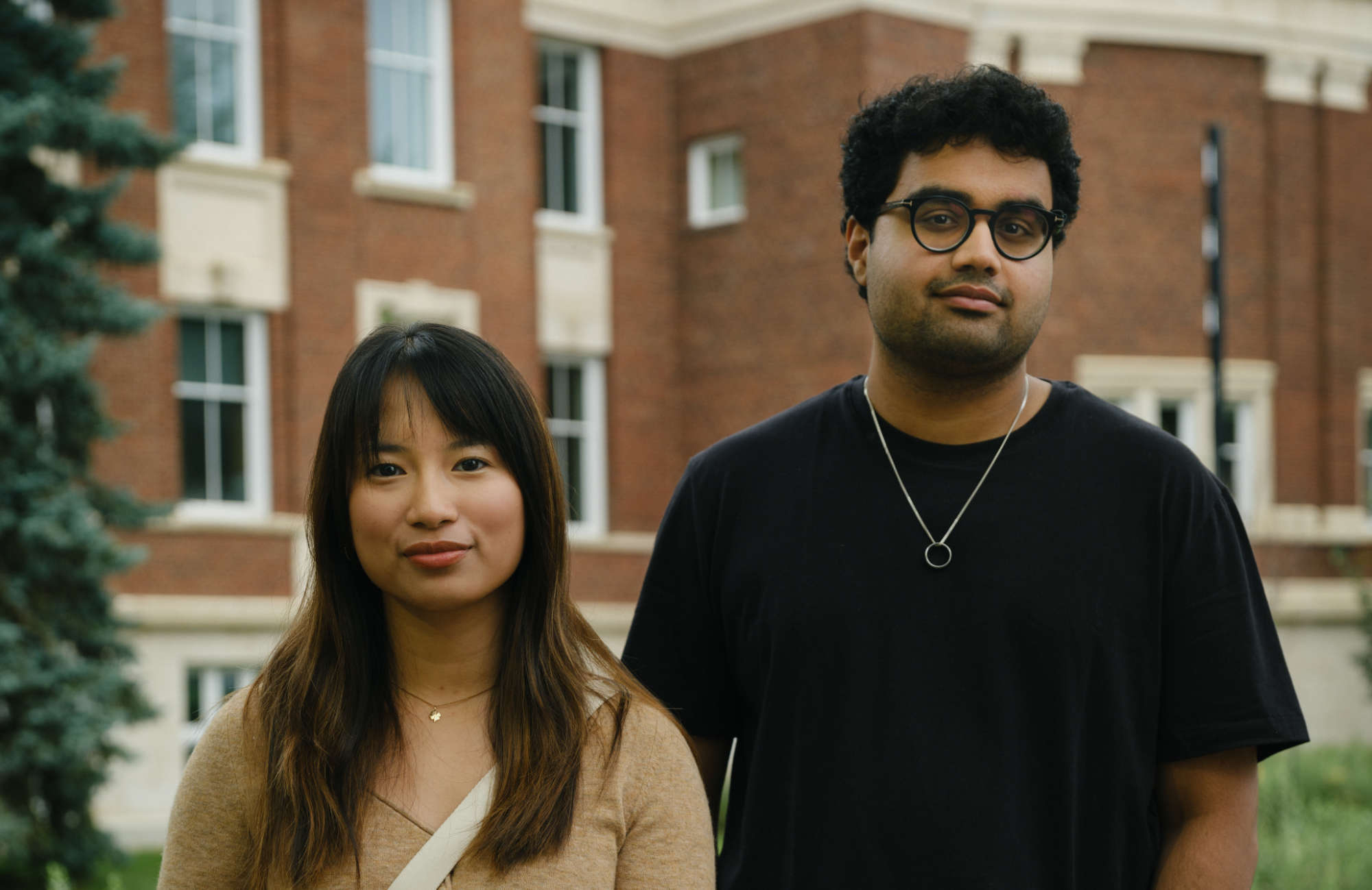 Two students standing outside