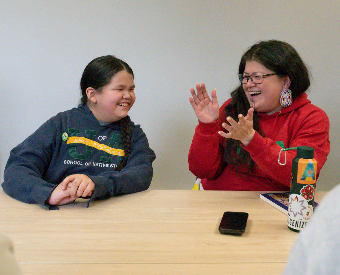 Students from the Faculty of Native Studies working with community members