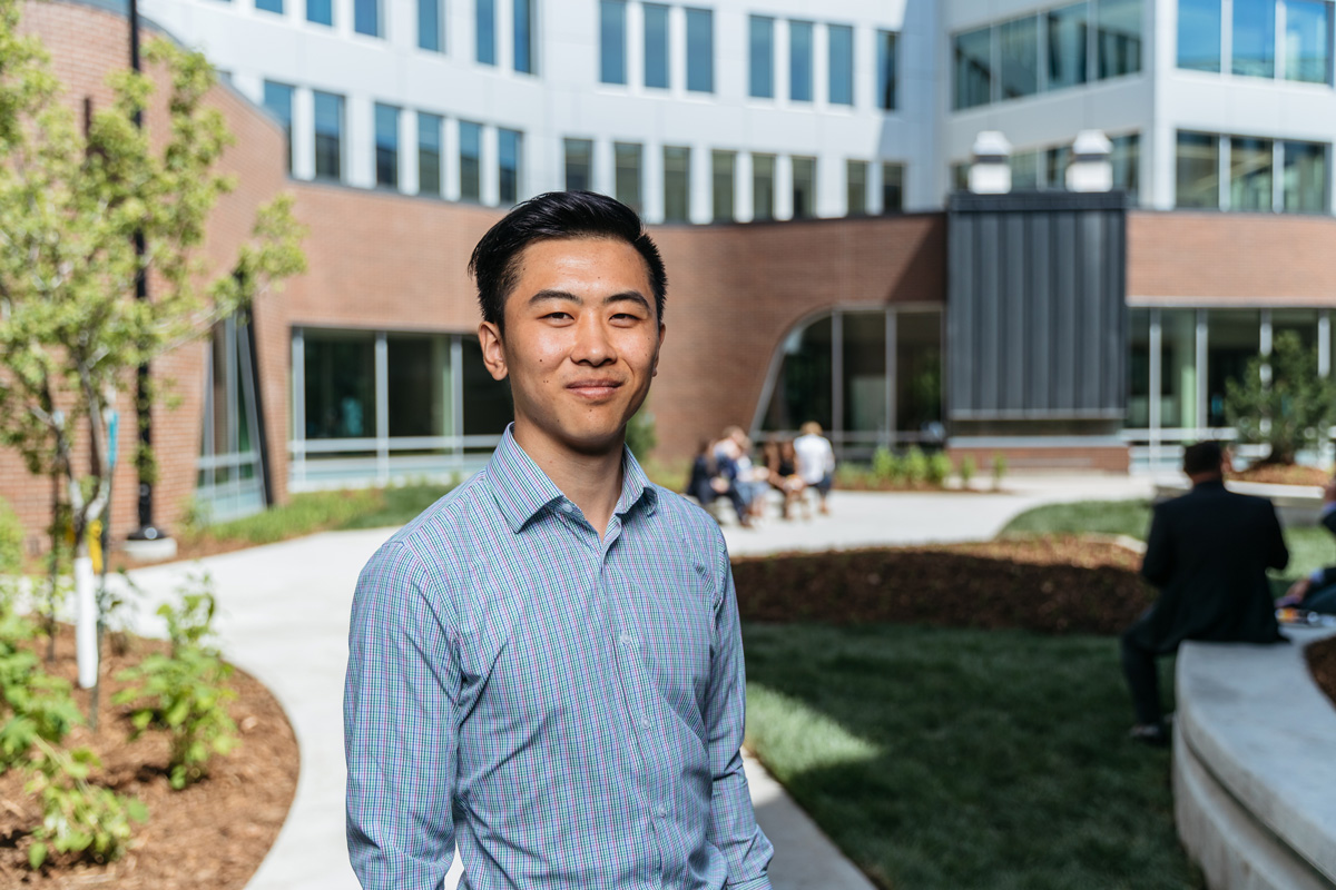 Jason Wang in front of Peter Lougheed Leadership College