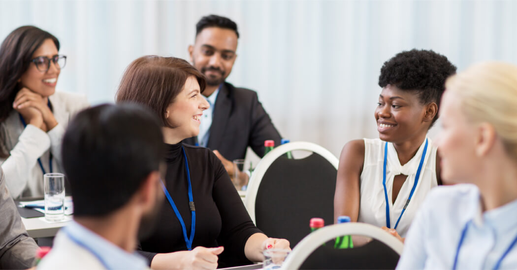 Group of students around a table at a PD event