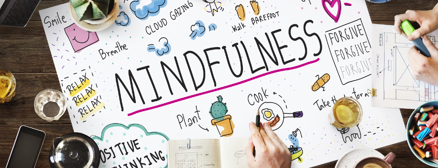 People writing on paper mindfulness