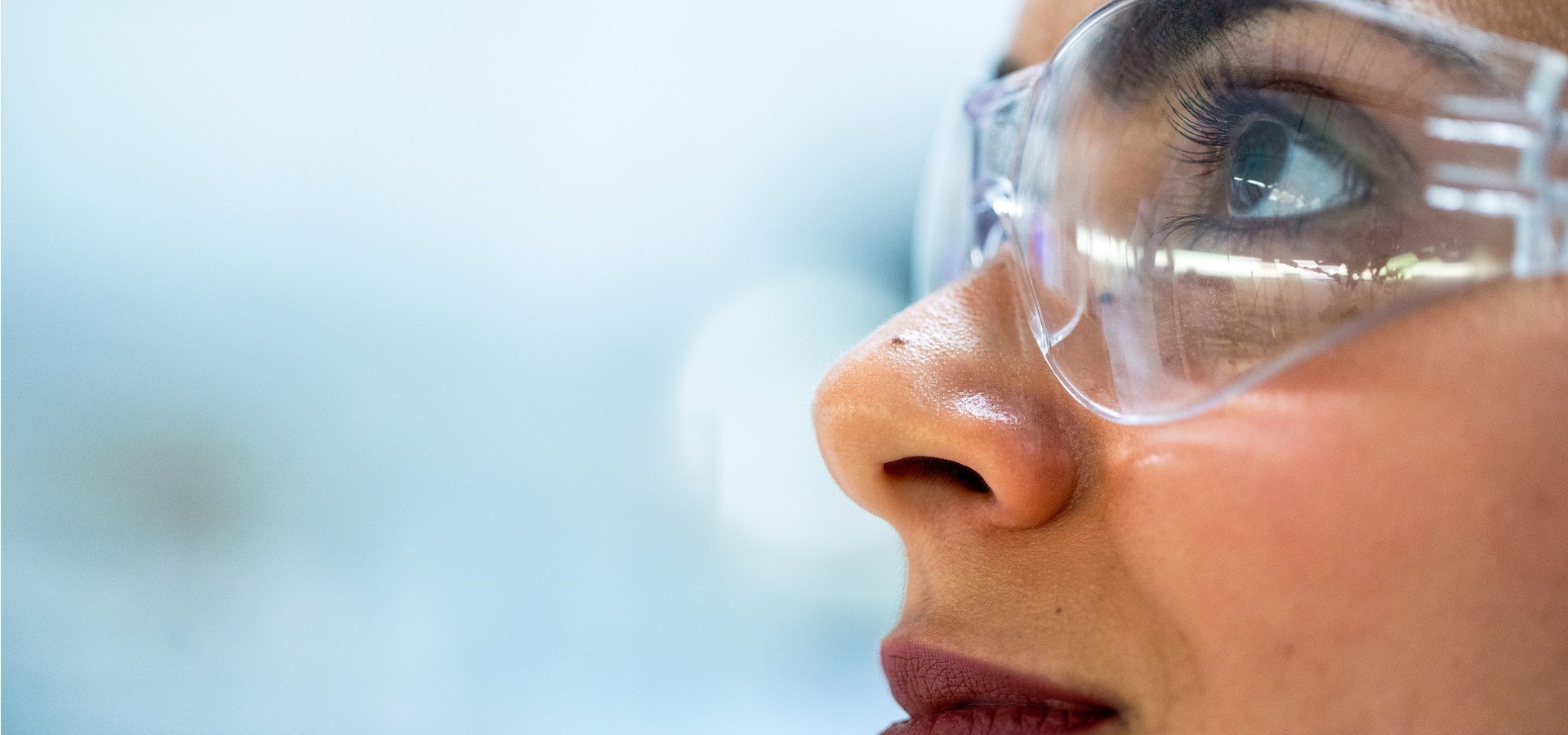 woman wearing safety glasses