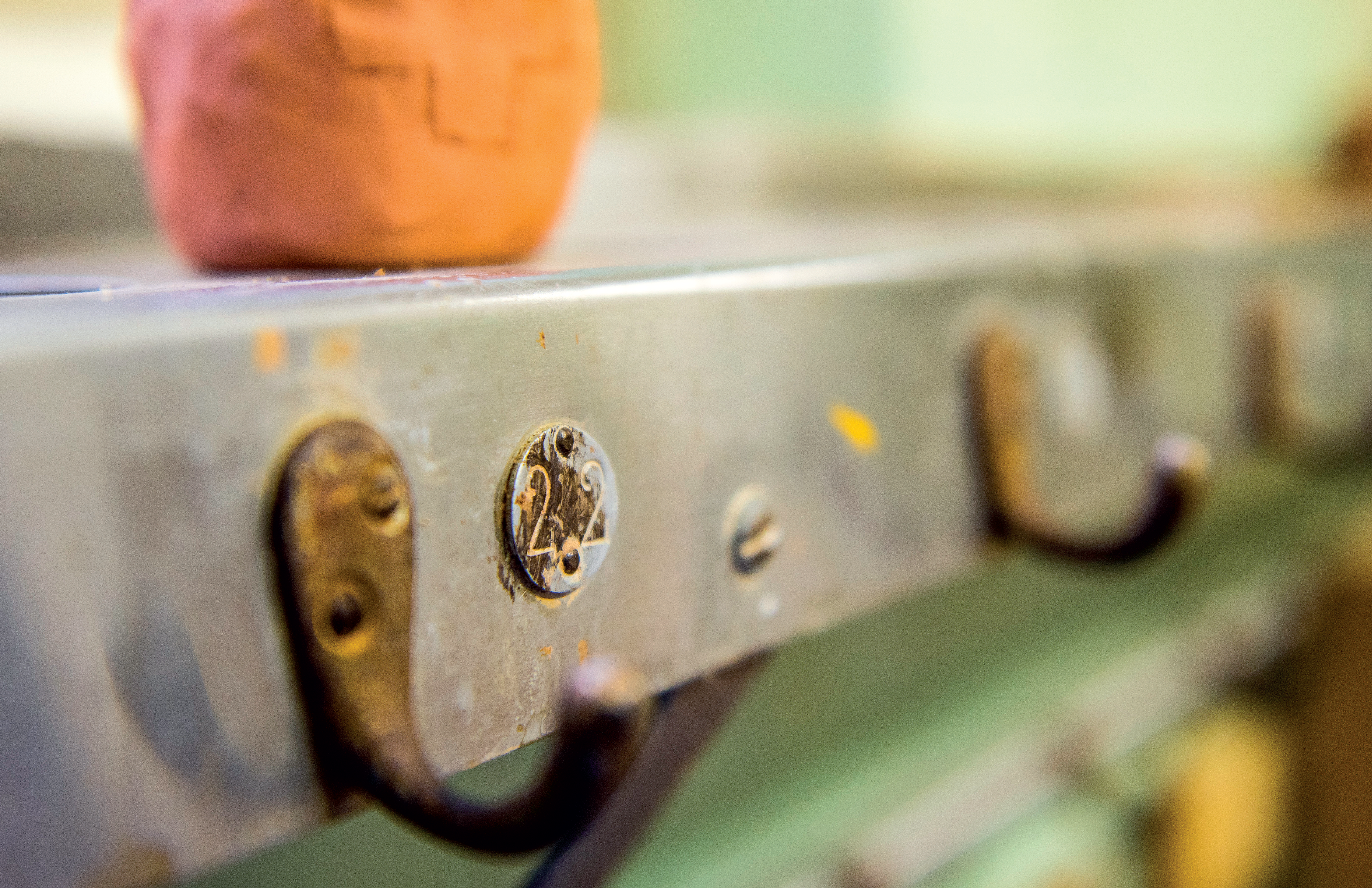 Number tags remain beside coat hooks in the mud rooms of the former Blue Quills residential school in St. Paul, AB, a reminder that students were often referred to by number in place of their given names.