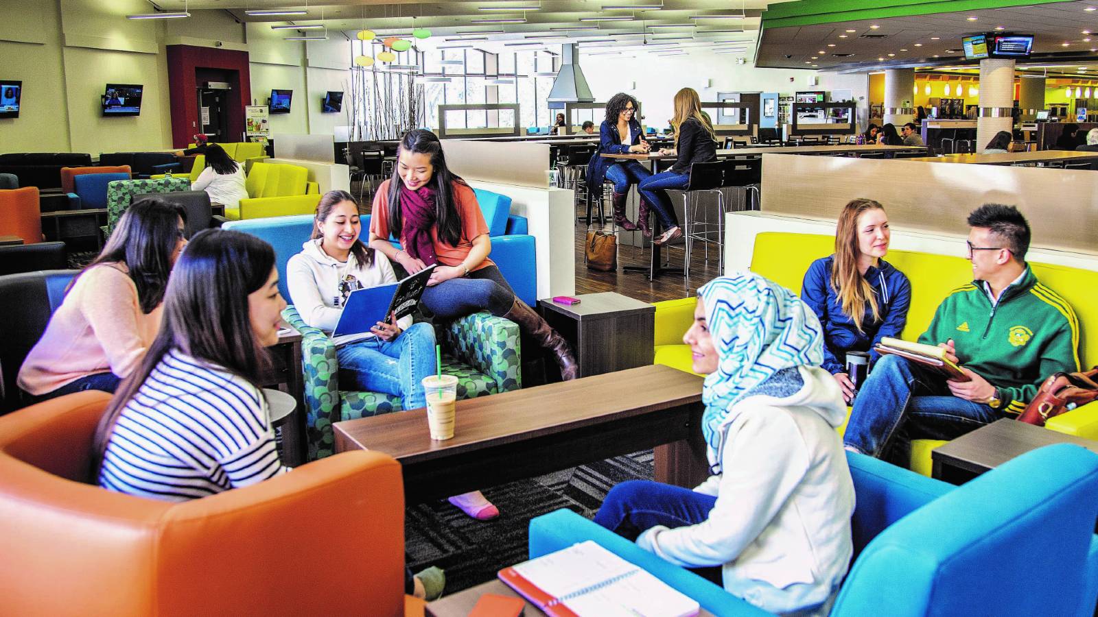 Students sitting in a student lounge