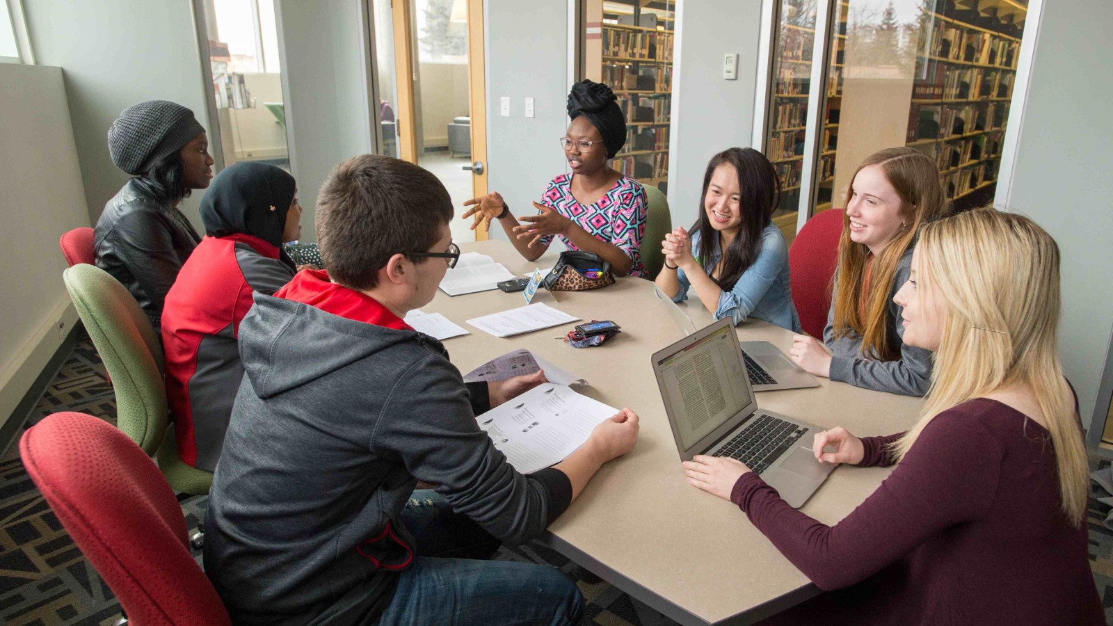 Group of students around a table