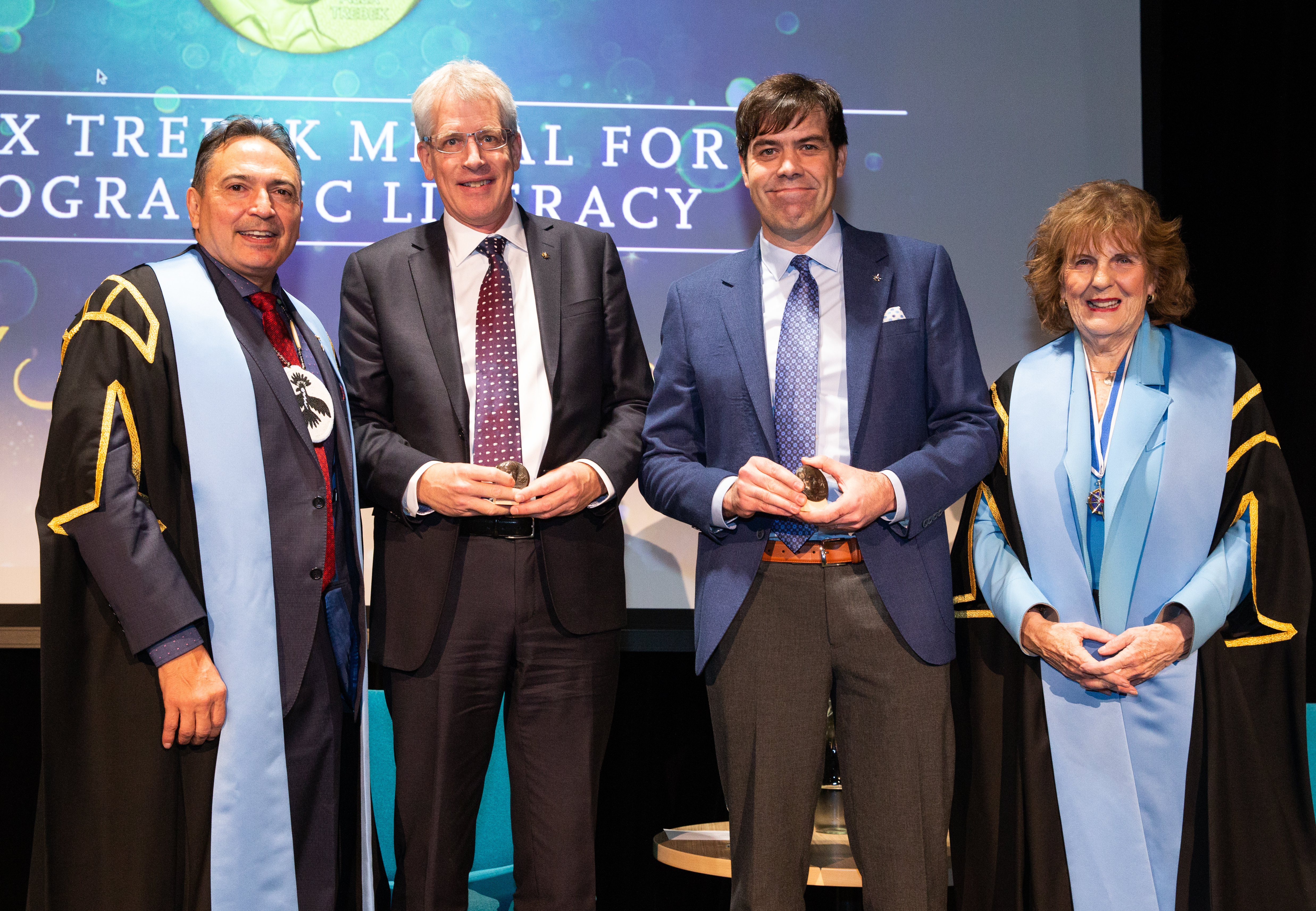 Zac Rbinson and David Hik receive Alex Trebel Medal