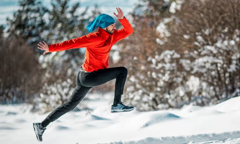 Image of someone running outside during winter.