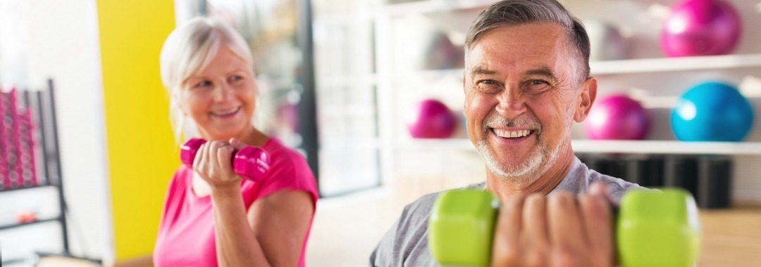 Two people lifting weights