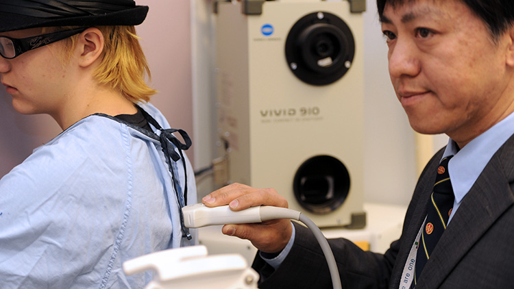 A patient receives ultrasound therapy.