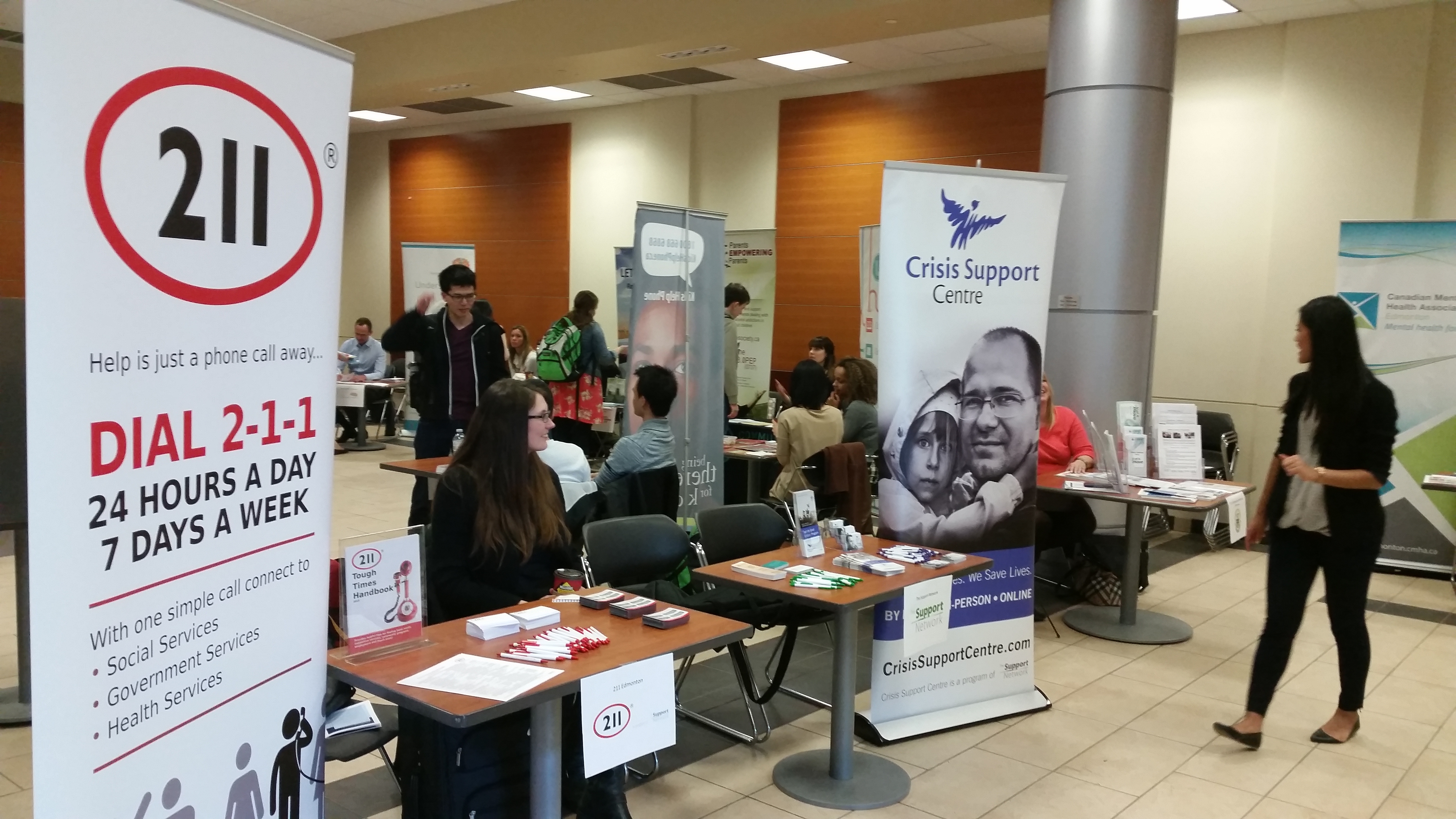 Faculty members and students learn about mental health supports in Edmonton at a booth fair for Mental Health Awareness Week.