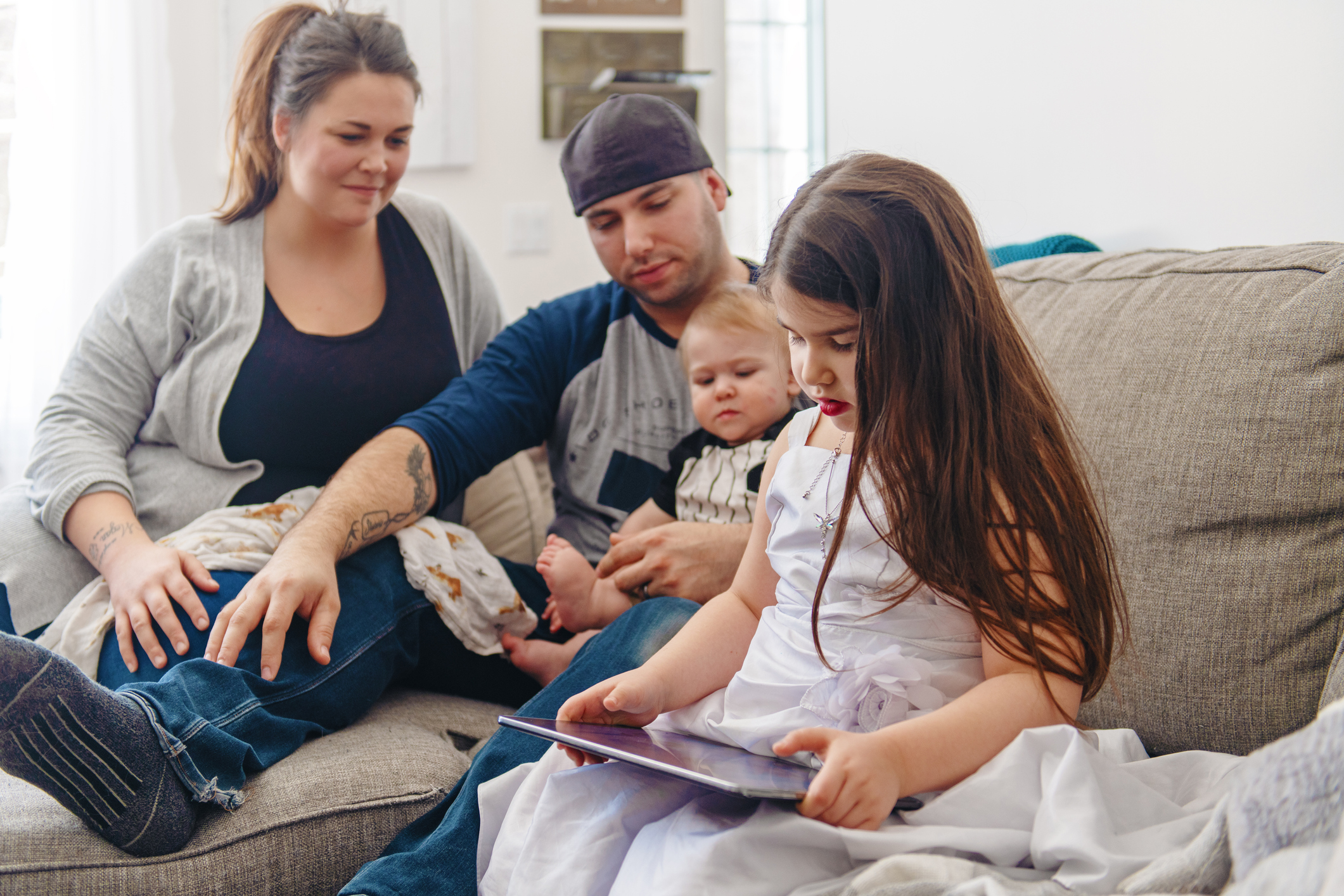 Young family on a couch