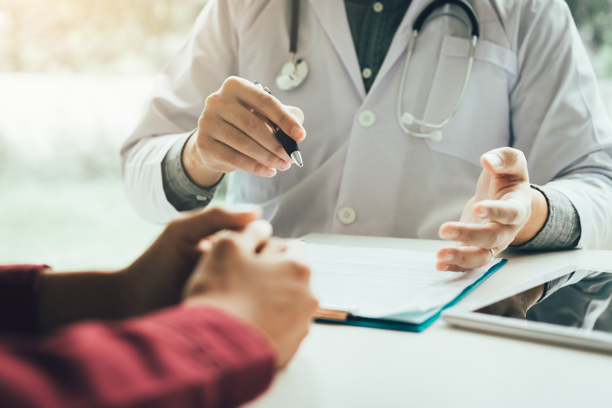 Doctor speaking with a patient