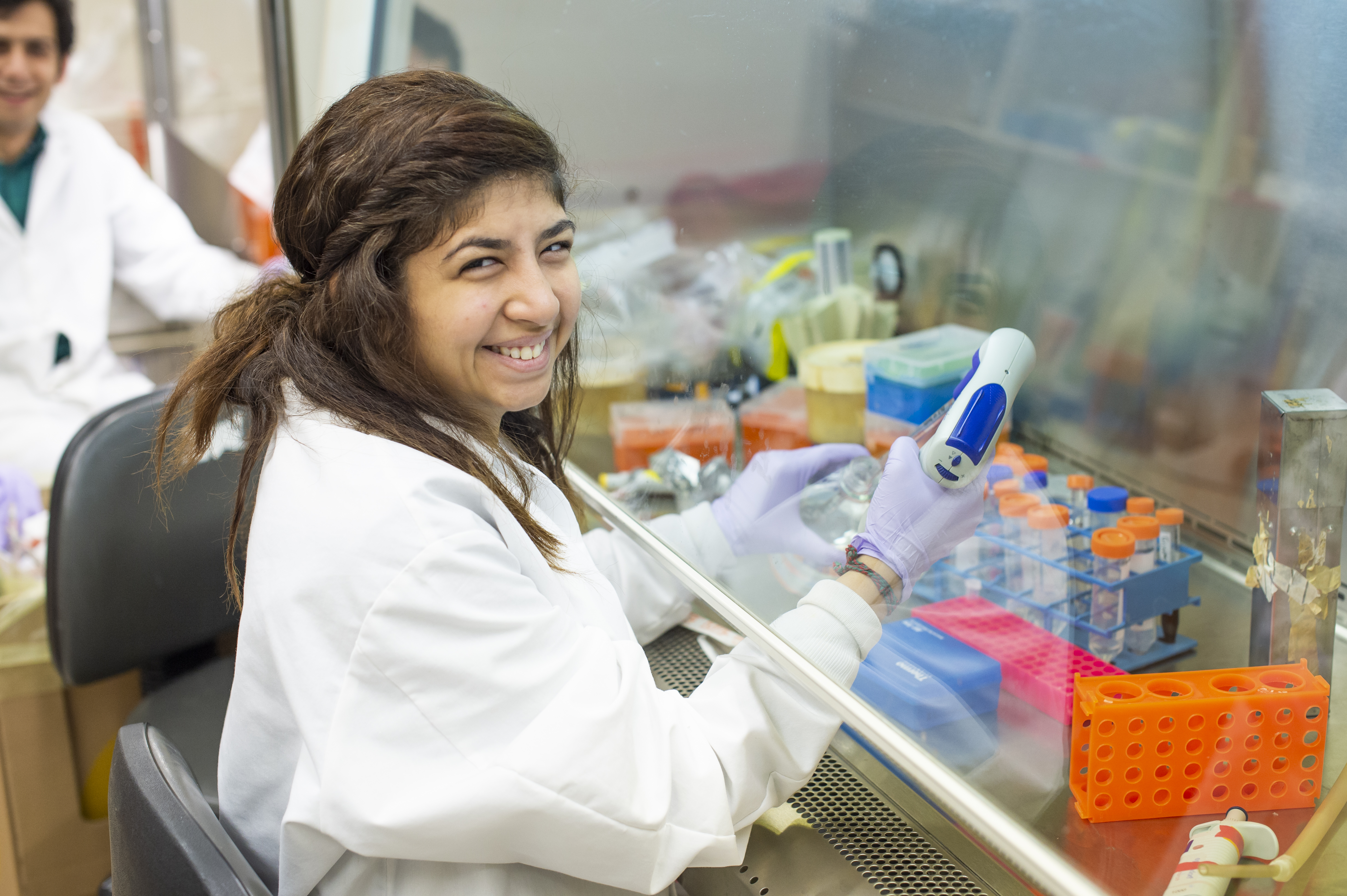 MatCH Student at fume hood with pipette